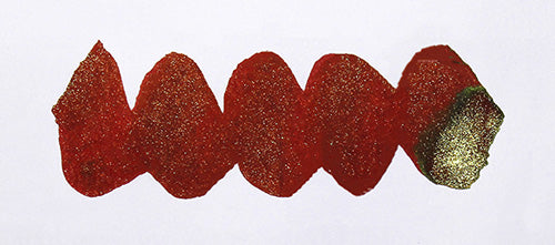 Wavy red line on a white background. Diamine Spiced Apple fountain pen ink colour swatch.