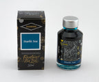 Diamine Starlit Sea fountain pen ink bottle and packaging on a white background.