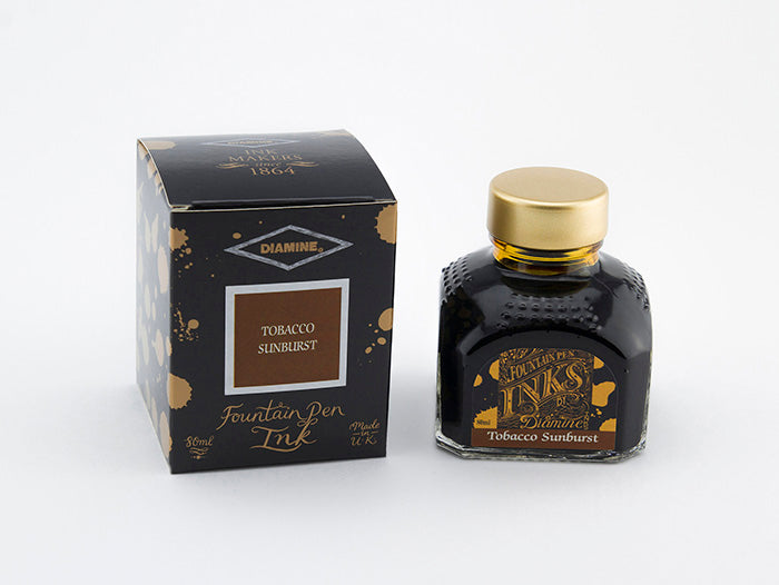 Diamine Tobacco Sunburst fountain pen ink bottle and packaging on a white background.