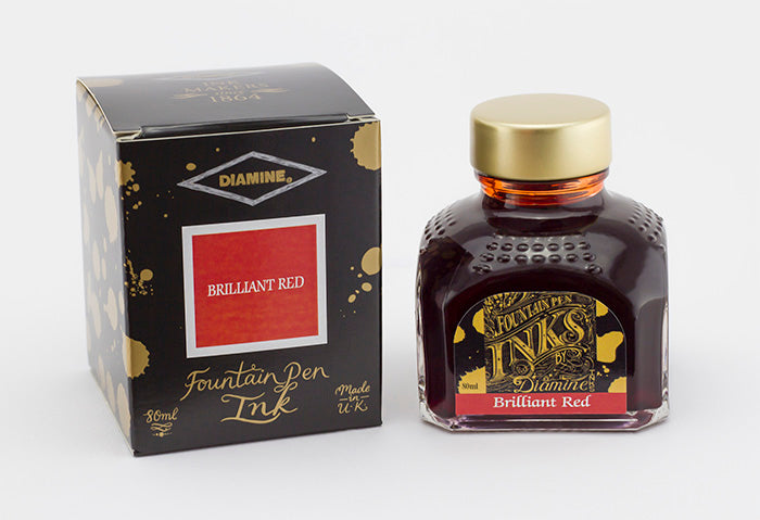 Diamine Brilliant Red fountain pen ink bottle and packaging on a white background.