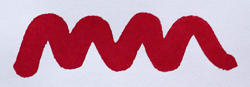 Wavy red line on a white background. Diamine Red Dragon fountain pen ink colour swatch.