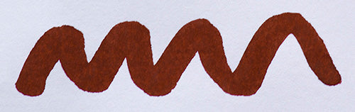Wavy brown line on a white background. Diamine Oxblood fountain pen ink colour swatch.