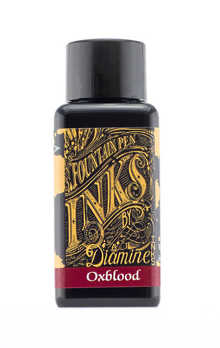 Diamine Oxblood fountain pen ink bottle and packaging on a white background.