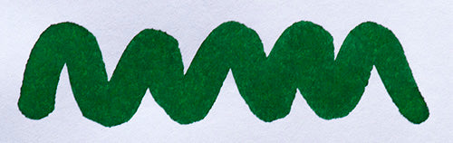 Wavy green line on a white background. Diamine Sherwood Green fountain pen ink colour swatch.
