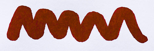 Wavy burgundy line on a white background. Diamine Syrah fountain pen ink colour swatch.