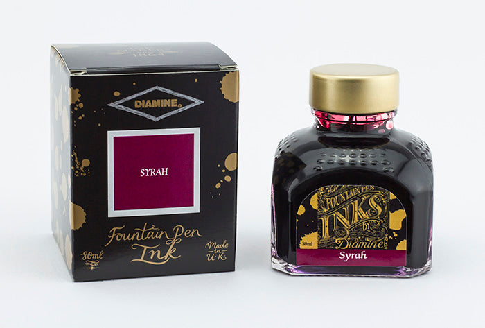Diamine Syrah fountain pen ink bottle and packaging on a white background.