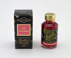 Diamine Pink Champagne fountain pen ink bottle and packaging on a white background.