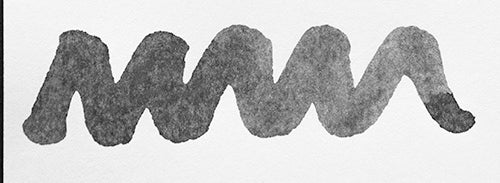 Wavy grey line on a white background. Diamine Silver Fox fountain pen ink colour swatch.