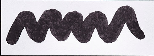 Wavy purple line on a white background. Diamine Vivaldi fountain pen ink colour swatch.