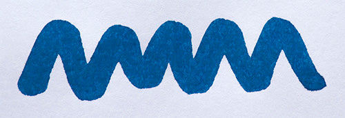 Wavy blue line on a white background. Diamine Asa Blue fountain pen ink colour swatch.