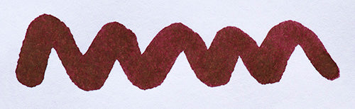 Wavy burgundy line on a white background. Diamine Merlot fountain pen ink colour swatch.