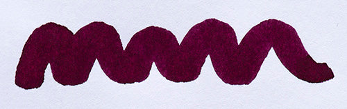 Wavy purple line on a white background. Diamine Grape fountain pen ink colour swatch.