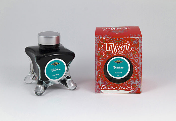 Diamine Yuletide fountain pen ink bottle and packaging on a white background.