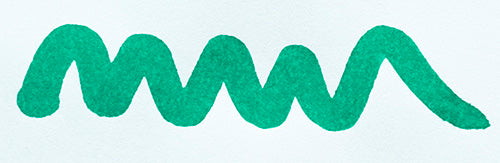 Wavy teal line on a white background. Diamine Steel Blue fountain pen ink colour swatch.