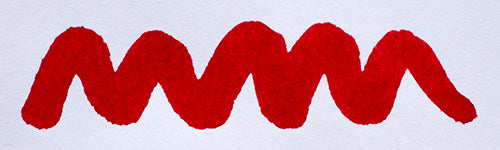 Wavy red line on a white background. Diamine Matador fountain pen ink colour swatch.