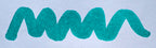 Wavy teal line on a white background. Diamine Aqua Lagoon fountain pen ink colour swatch.