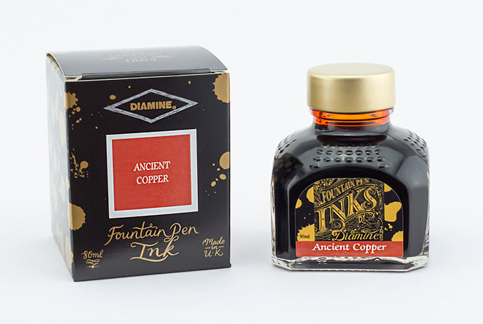 Diamine Ancient Copper fountain pen ink bottle and packaging on a white background.