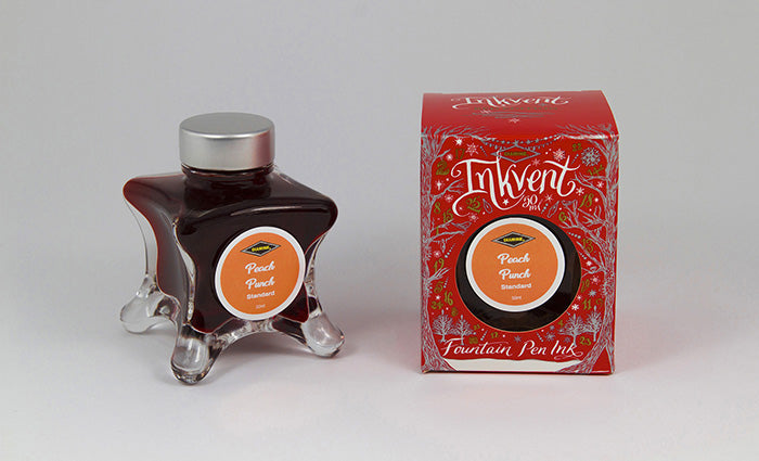Diamine Peach Punch fountain pen ink bottle and packaging on a white background.