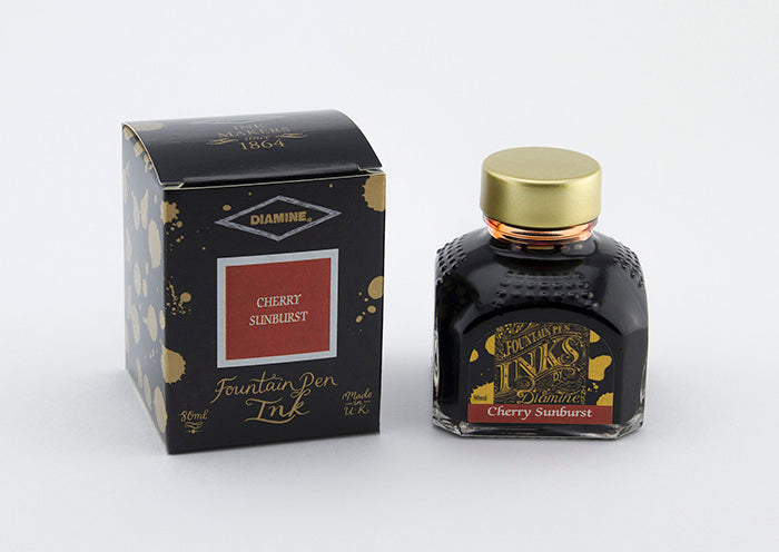 Diamine Cherry Sunburst fountain pen ink bottle and packaging on a white background.