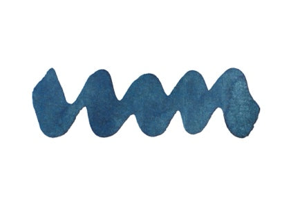 Wavy blue line on a white background. Diamine Blue Indigo Forever Ink fountain pen ink colour swatch.