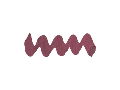 Wavy purple line on a white background. Diamine Forest Gateau fountain pen ink colour swatch.