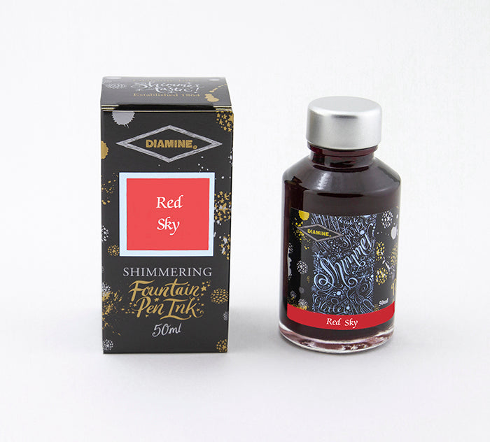 Diamine Red Sky fountain pen ink bottle and packaging on a white background.