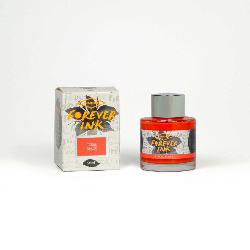 Diamine Coral Blaze Forever Ink fountain pen ink bottle and packaging on a white background.