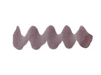 Wavy purple line on a white background. Diamine Smoky Mauve Forever Ink fountain pen ink colour swatch.
