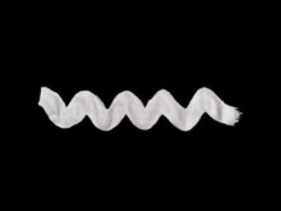 Wavy silver line on a black background. Diamine Silver calligraphy and drawing ink colour swatch.